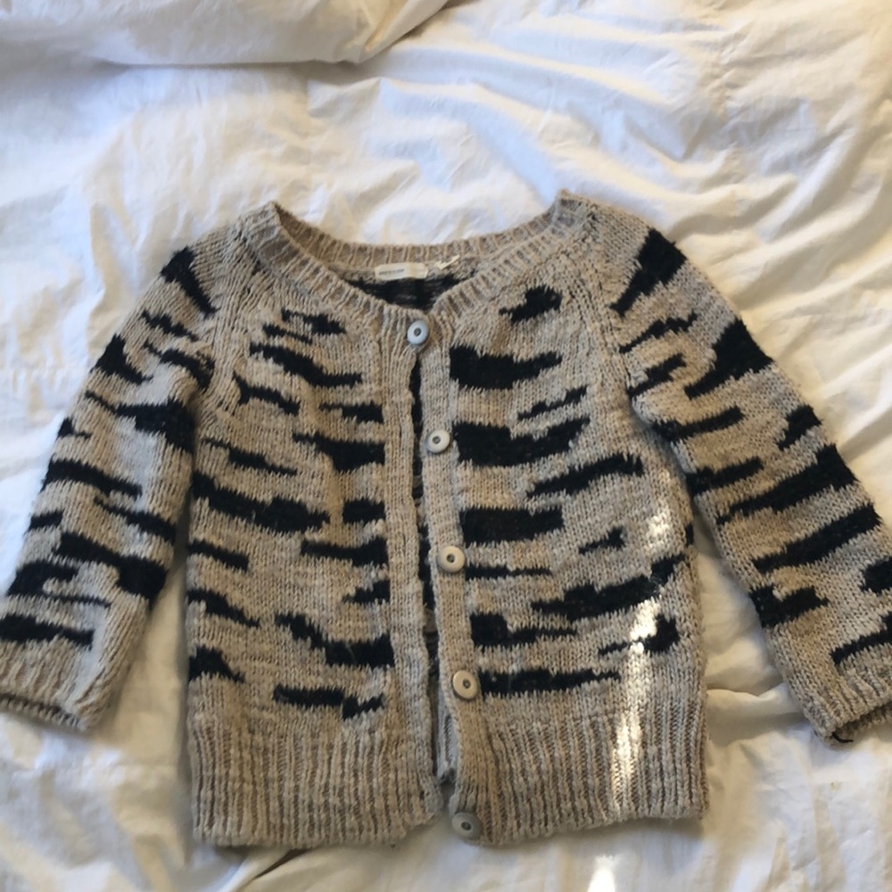 Sleeping on Snow Zebra ish sweater